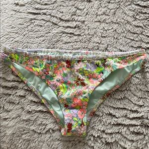 Victoria Secret’s swim bottom ruffles bright